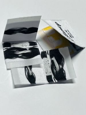 Nhãn áo được dệt theo yêu cầu Nhãn áo 0.4mm Logo 5000pcs