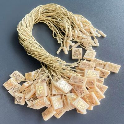 Unique And Eye-catching Plastic Tag Fastener Embossed Technic Ideal Clothing Tagging Durable Secure Attachment Solutions